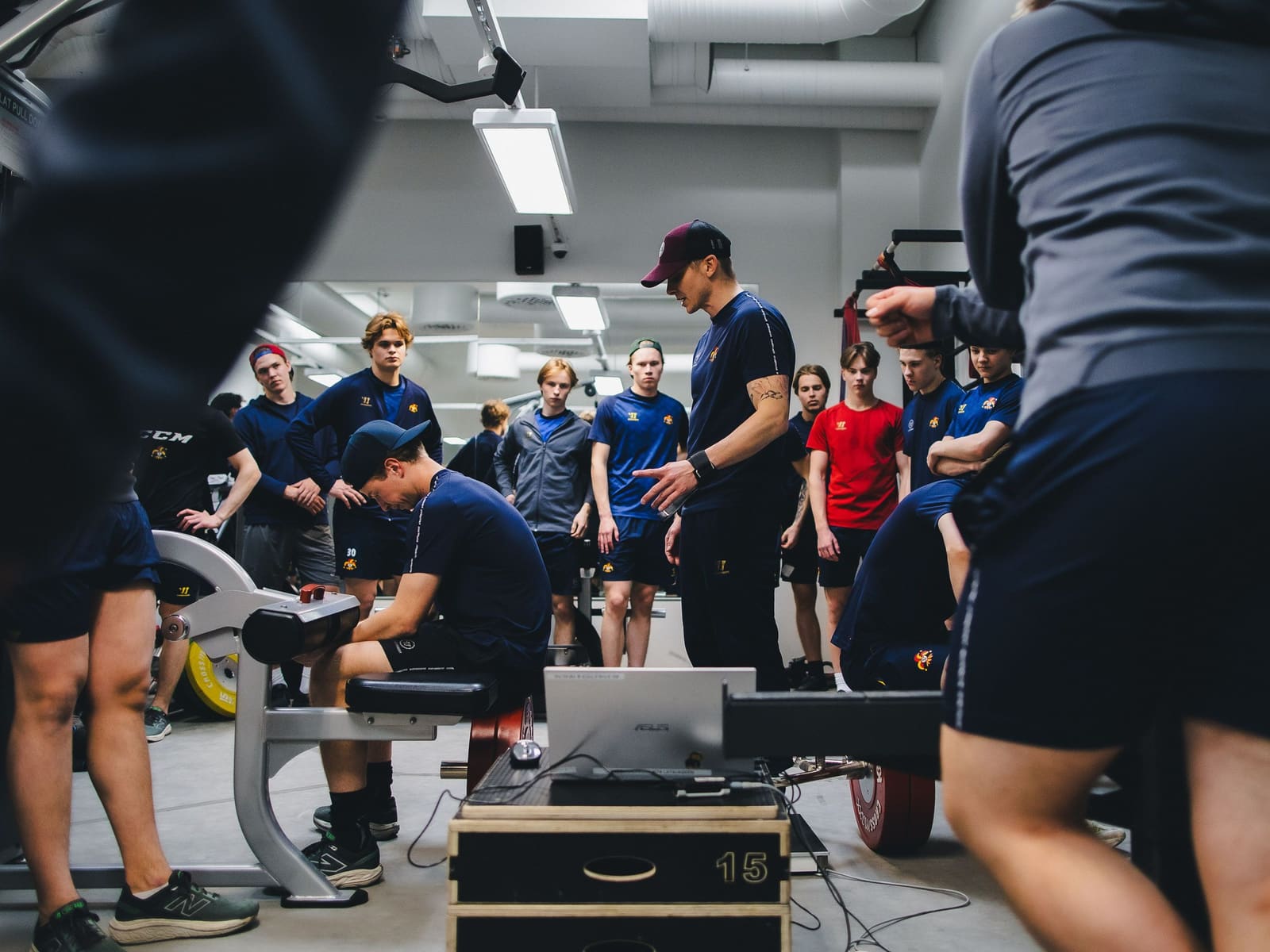 Johan Lahti coaching Jokerit U20 players in the gym.